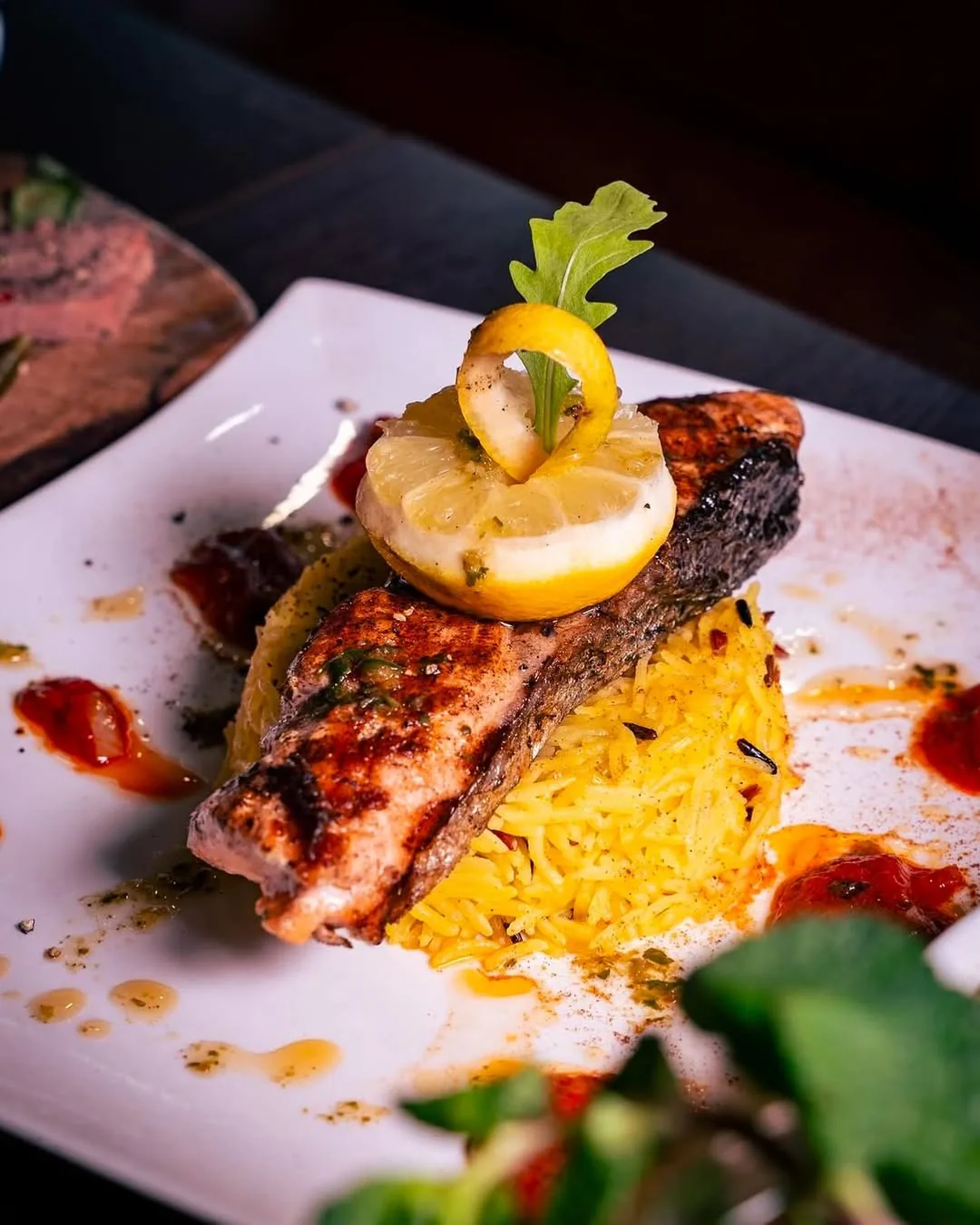 Salmon fillet cut on site, saffron rice, lemon